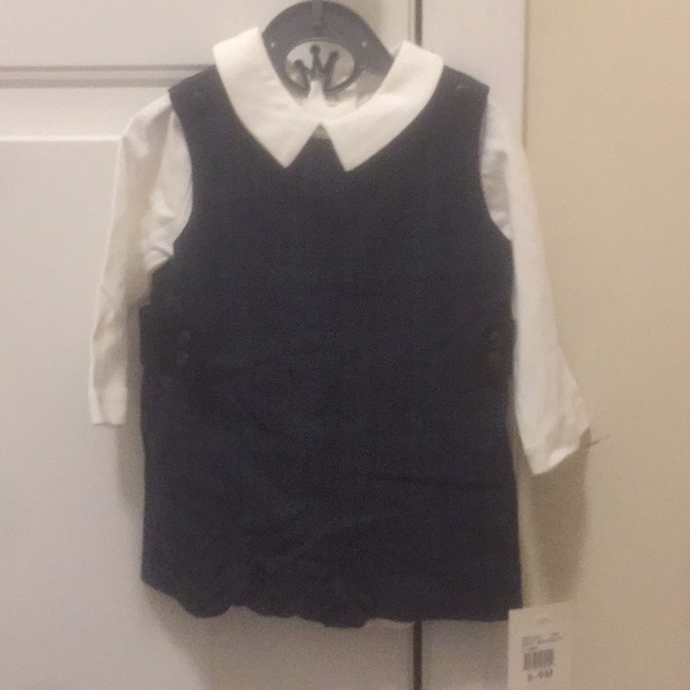 John John with long-sleeve collared onesie.